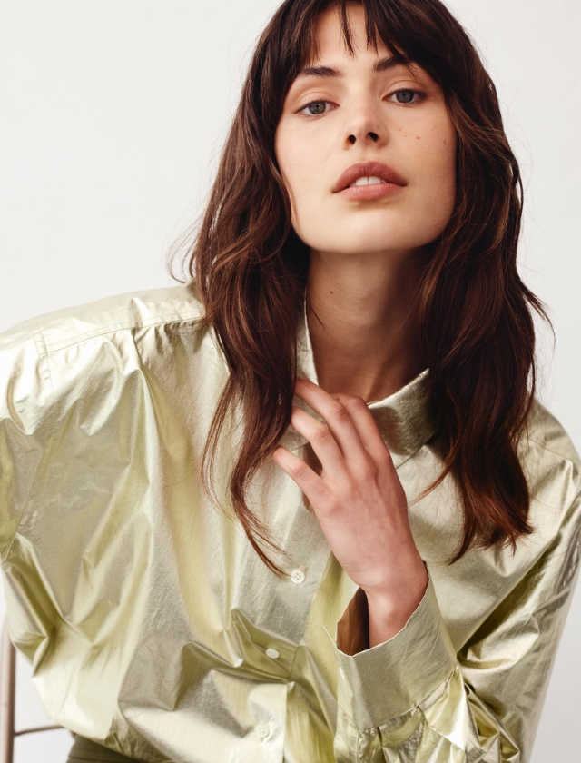 Man walking to a marooned boat